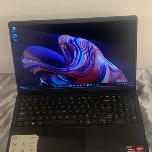 Black Dell Inspiron 15 with Rizen 7 and amd processor